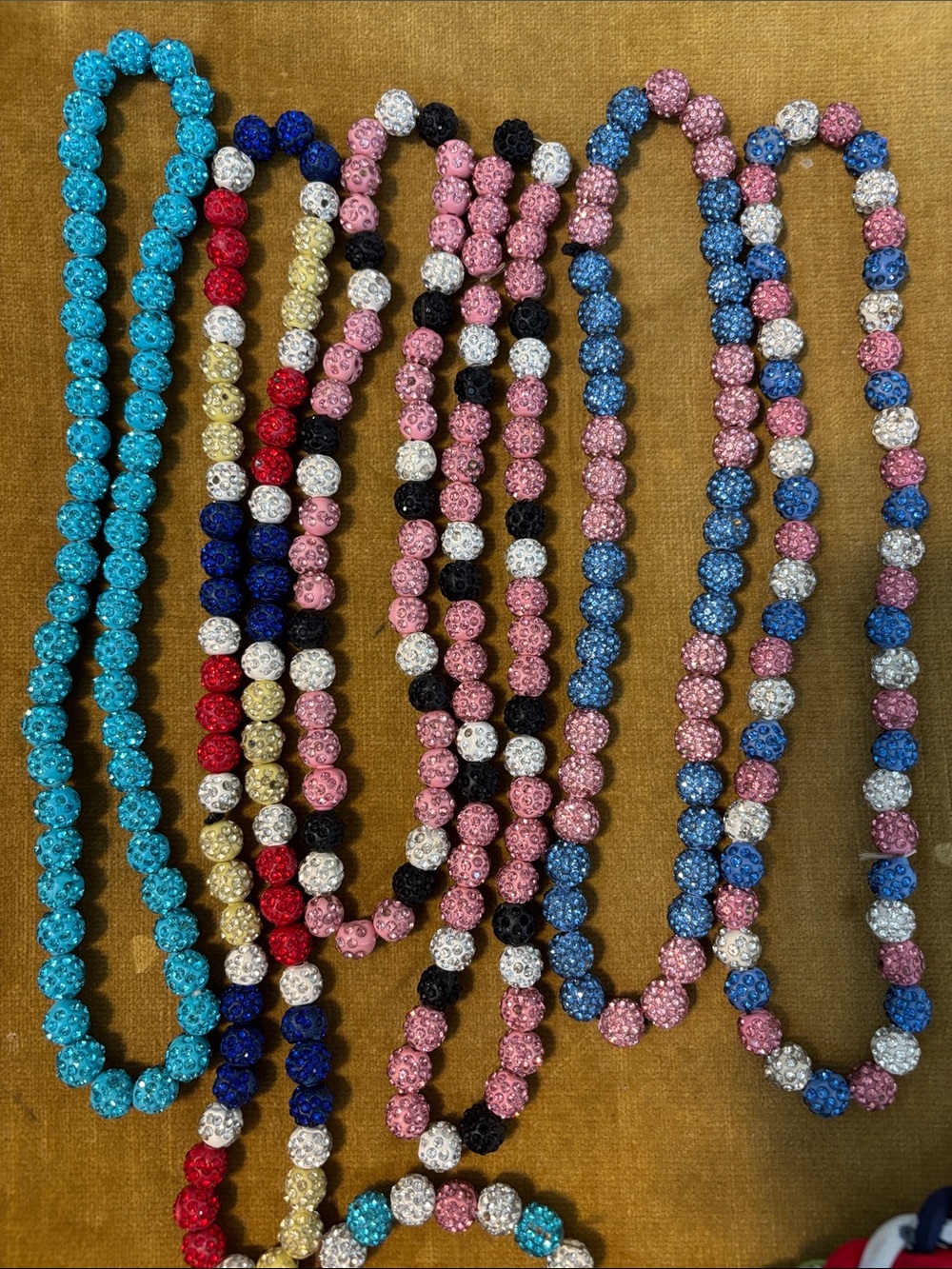 Bundle of baseball necklaces and bracelet